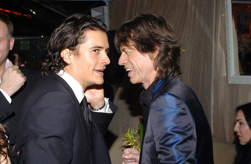 <p>Bloom and Jagger gossiped at Weinstein’s 2005 fete. The duo were clearly dishing some juicy secrets… (Photo: L. Cohen/WireImage for <em>Glamour</em>) </p>