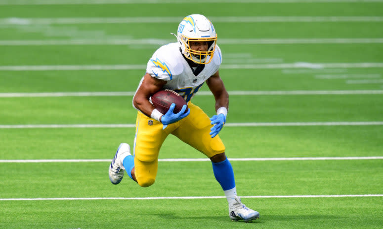 Austin Ekeler runs the football for the Chargers.