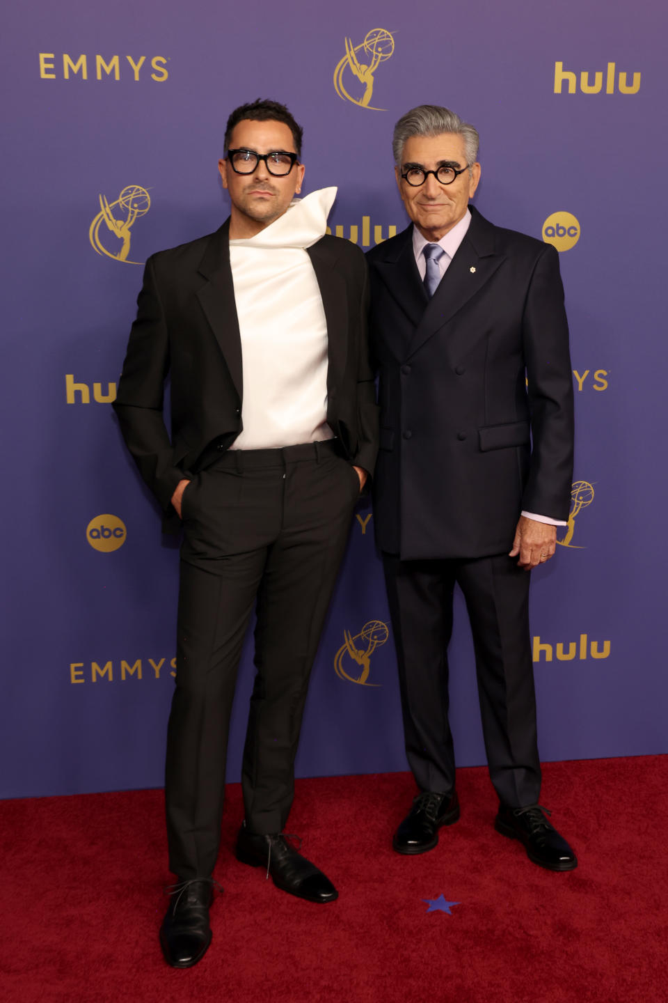 LOS ANGELES, CALIFORNIA - SEPTEMBER 15: (L-R) Dan Levy and Eugene Levy attend the 76th Primetime Emmy Awards at Peacock Theater on September 15, 2024 in Los Angeles, California. (Photo by Kevin Mazur/Kevin Mazur/Getty Images)