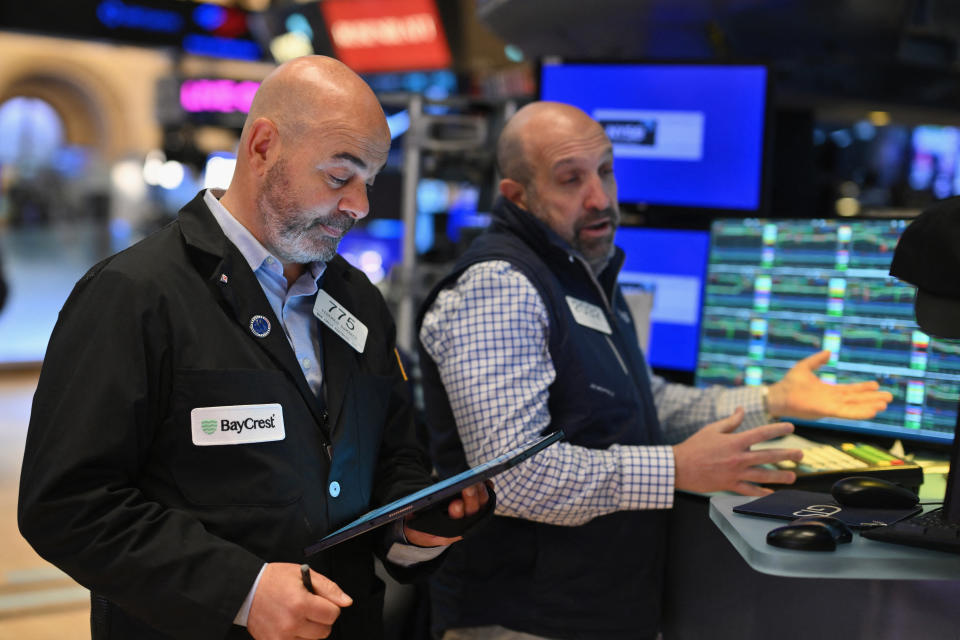 Traders work on the floor of the New York Stock Exchange during morning trading on May 17, 2024 in New York City. Wall Street stocks opened little changed May 17 after pulling back from a record run where the Dow exceeded 40,000 points for the first time. Around 10 minutes into trading the Dow Jones Industrial Average was steady at 39,872.66. (Photo by ANGELA WEISS / AFP) (Photo by ANGELA WEISS/AFP via Getty Images)