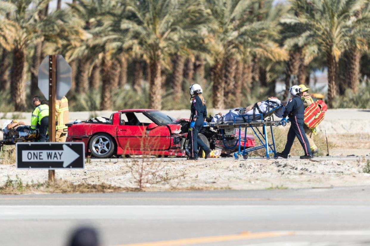 Medics help a patient injured in a crash Sunday at the intersection of State Route 86 and 81st Avenue in Oasis.