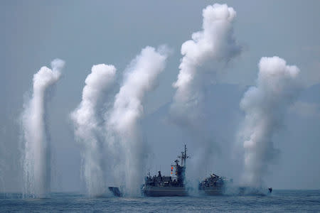 Flares are set off from Fong Yang (FFG-933) Chi Yang class frigate (Knox class) during a drill near Yilan naval base, Taiwan April 13, 2018. REUTERS/Tyrone Siu