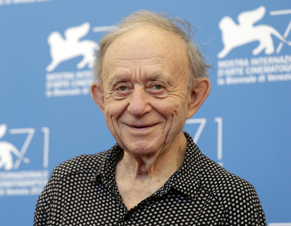 FILE - In this Aug. 29, 2014, file photo, Frederick Wiseman poses for photographers during the photo call for the Golden Lion Career Award during the 71st edition of the Venice Film Festival in Venice, Italy. Wiseman has spent more than half a century documenting American institutions. His latest is a profile of American government. In “City Hall” Wiseman has turned his camera on the Boston city government. After drawing acclaim at the major fall film festivals, it opens in late October. (AP Photo/David Azia, File)