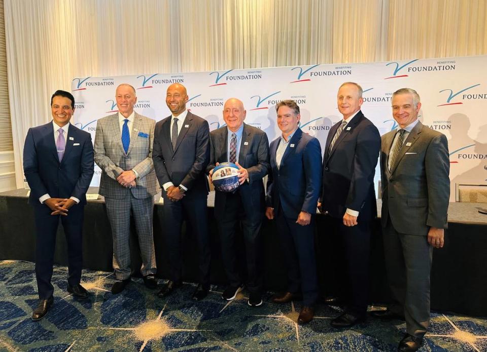 Dick Vitale, center, stands with host Kevin Negandhi, far left, and the 2024 Vitale Gala honorees from left to right: Jim Kelly, Derek Jeter, Jeff Gordon, Rick Barnes and Shane Jacobson.