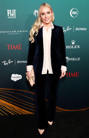 <p>Kevin Mazur/Getty Images for TIME</p> Lindsay Vonn on the red carpet at the TIME Women of the Year 2024 Gala