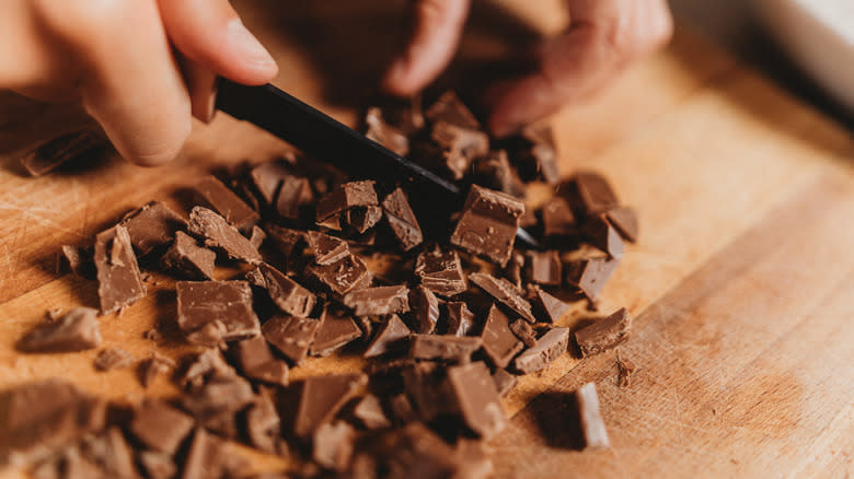 Chopping a bar of baking chocolate