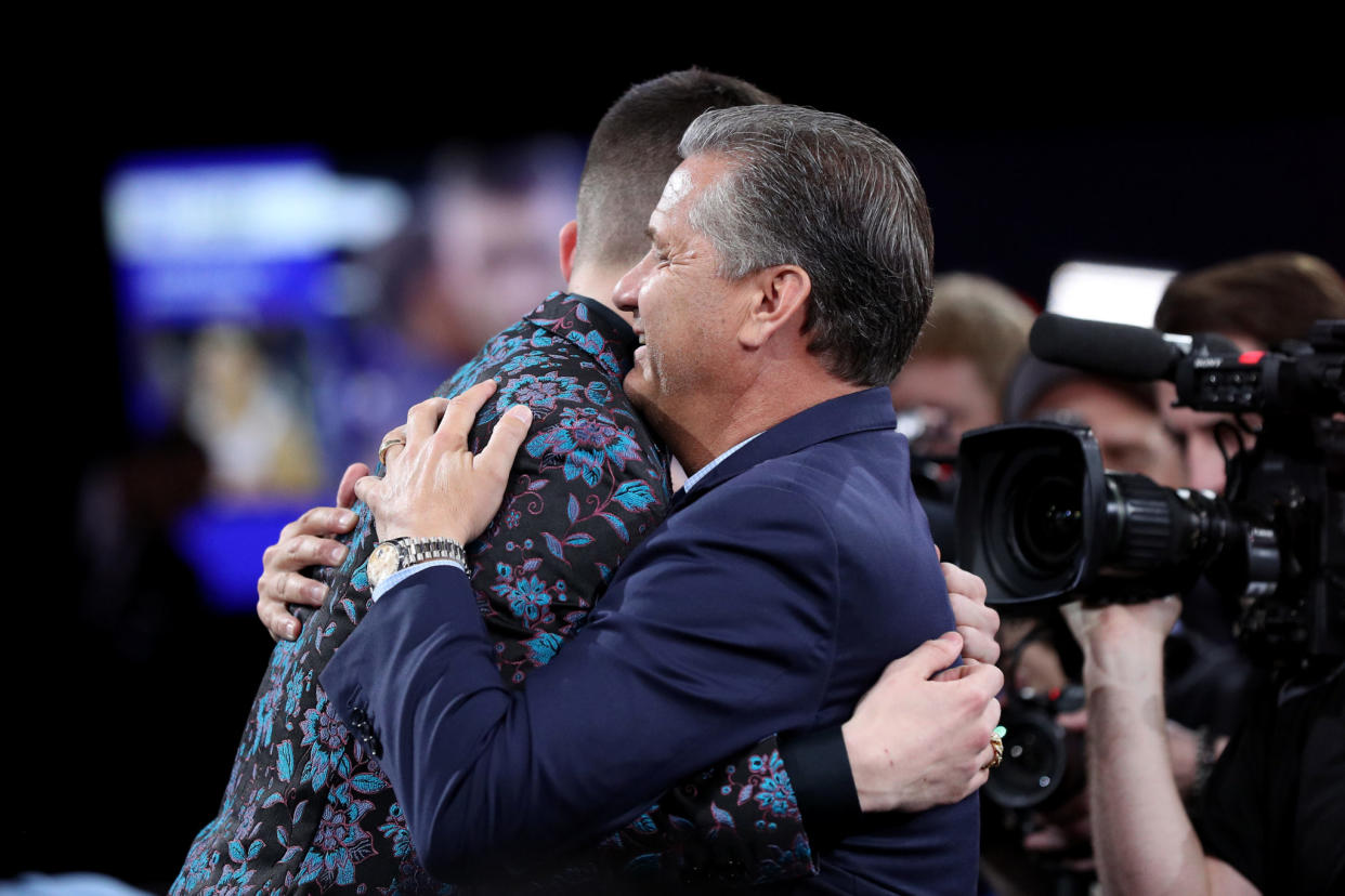 John Calipari and Tyler Herro embrace at the NBA Draft.