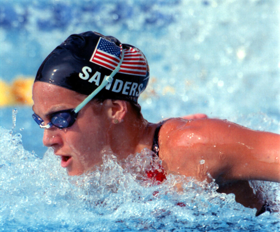 USA's Summer Sanders, swims for the gold medal in the 200-meter butterfly race at the Summer Olympics in Barcelona July 31, 1992. (AP Photo)