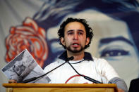 <p>Missael Garcia, of Baltimore, Md., who is a DACA recipient, cries as he holds a photo of his four-month-old daughter, Luna, as he speaks about his fears of being separated from his daughter during an event in support of the Deferred Action for Childhood Arrivals (DACA) program Wednesday, Feb. 7, 2018, at the Lutheran Church of the Reformation, near the Capitol in Washington. (Photo: Jacquelyn Martin/AP) </p>