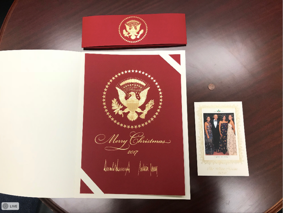 Trump's Christmas poster vs Obama's Christmas card.