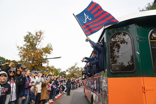 ATLANTA, GA - NOVEMBER 05: Fans cheer for the Atlanta Braves during the World Series Parade at Truist Park on November 5, 2021 in Atlanta, Georgia. The Atlanta Braves won the World Series in six games against the Houston Astros winning their first championship since 1995. (Photo by Megan Varner/Getty Images)