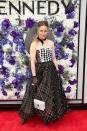 <p>Melissa George went for a very mismatched look in this frock that was littered with multiple patterns and colours.</p>