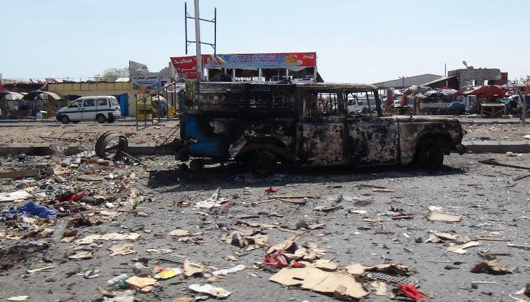 Picture taken on April 17, 2015 shows the wreckage of a truck reportedly belonging to Huthi rebels which was destroyed the day before in an air strike by Saudi-led forces at a market in the Dar Saad suburb of the port city of Aden