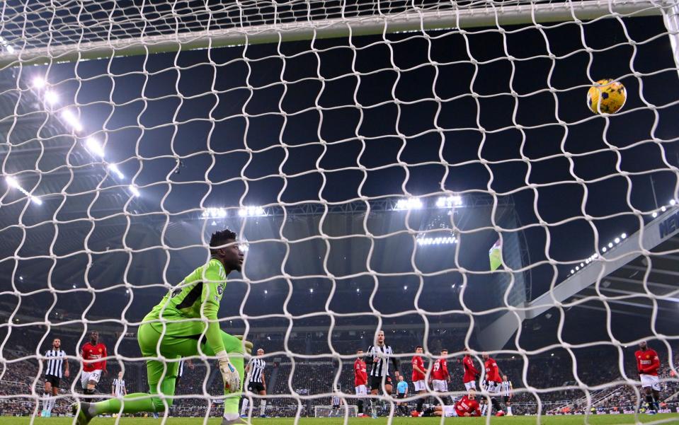 Andre Onana watches Kieran Trippier's free-kick hit the crossbar