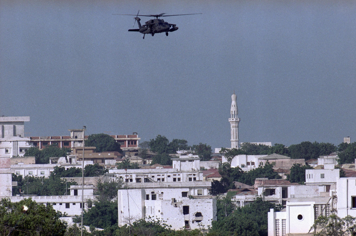 A U.S. Army Blackhawk helicopter patrols Mogadishu, Somalia