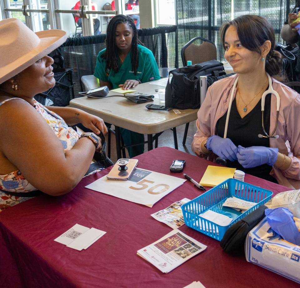 One of the many nurses working at the Women of Clarksville Expo event.