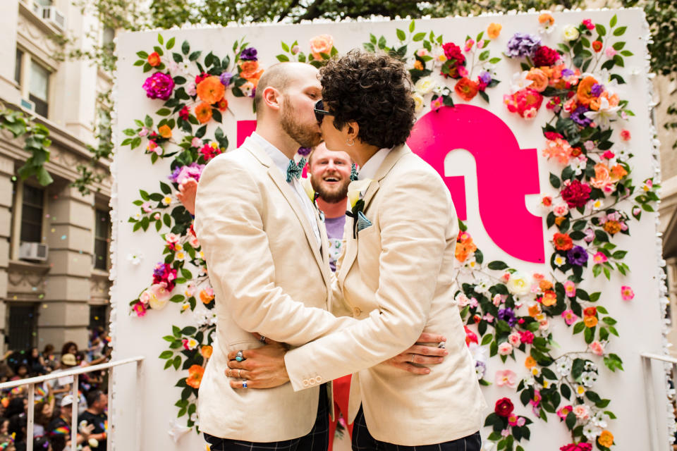 Berk (rear) officiated the wedding of&nbsp;Andrew Pharis and Guillermo Irias during the New York Pride parade on Sunday. (Photo: Kelly Balch)