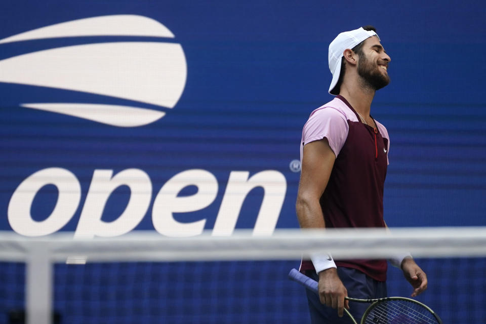 Karen Khachanov, of Russia, reacts during competition against Casper Ruud, of Norway, during the semifinals of the U.S. Open tennis championships, Friday, Sept. 9, 2022, in New York. (AP Photo/John Minchillo)