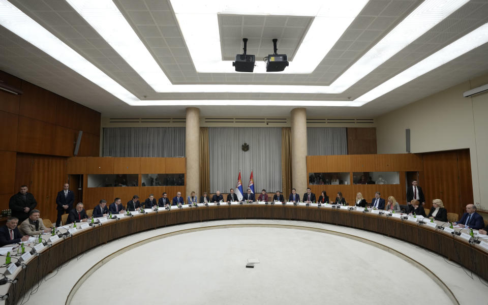Serbian President Aleksandar Vucic, center, attends the government session in Belgrade, Serbia, Thursday, Dec. 15, 2022. Serbia on Thursday formally demanded that its security forces return to the breakaway former province of Kosovo, despite warnings from the West that such calls are unlikely to be accepted and only add to tensions in that part of the Balkans. (AP Photo/Darko Vojinovic)