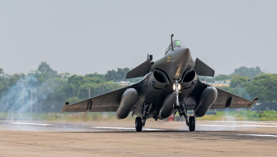 This photograph provided by the Indian Air Force shows a Rafale fighter jet landing at Air Force Station in Ambala, India, Wednesday, July 29, 2020. A first batch of five French-made Rafale fighter jets arrived at an Indian air force base on Wednesday, Indian officials said. (Indian Air Force via AP)