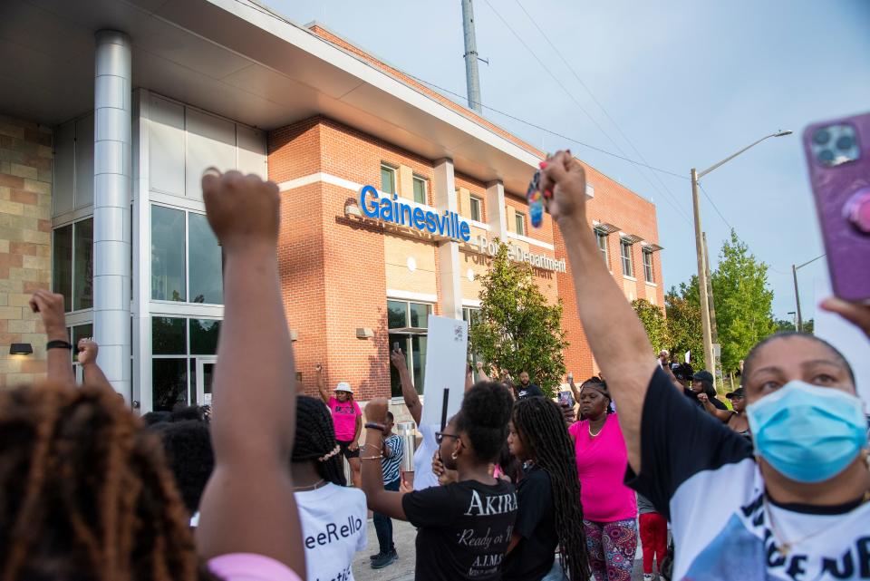 Protestors gather in front of the Gainesville Police Department building during a protest for Terrell Bradley in Gainesville, Fla., on Sunday, July 17, 2022.