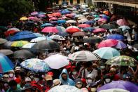 Pro-democracy protesters attend a mass rally in Bangkok