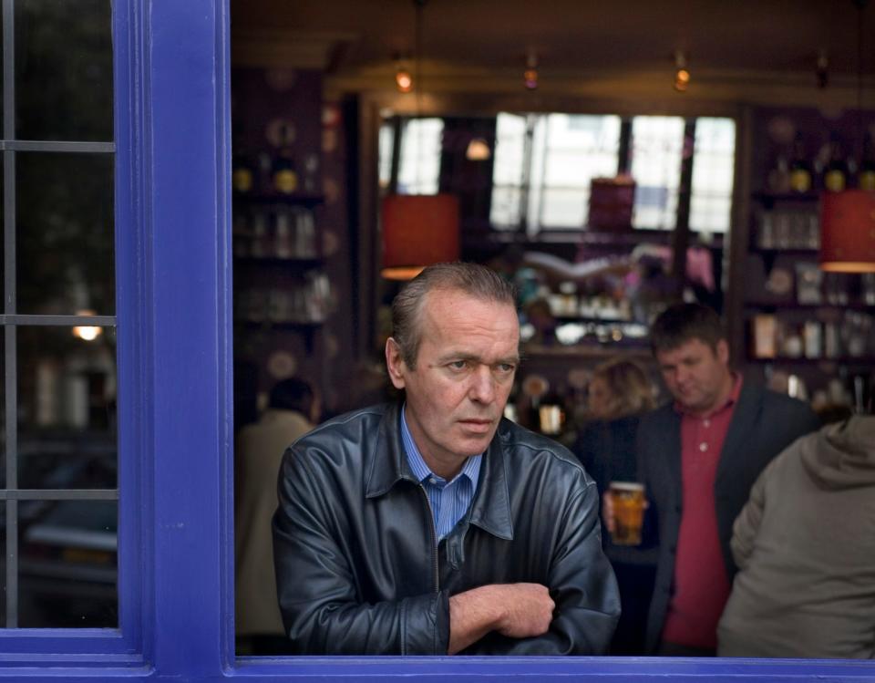 the late author Martin Amis in a pub in Notting Hill, west London, in 2005