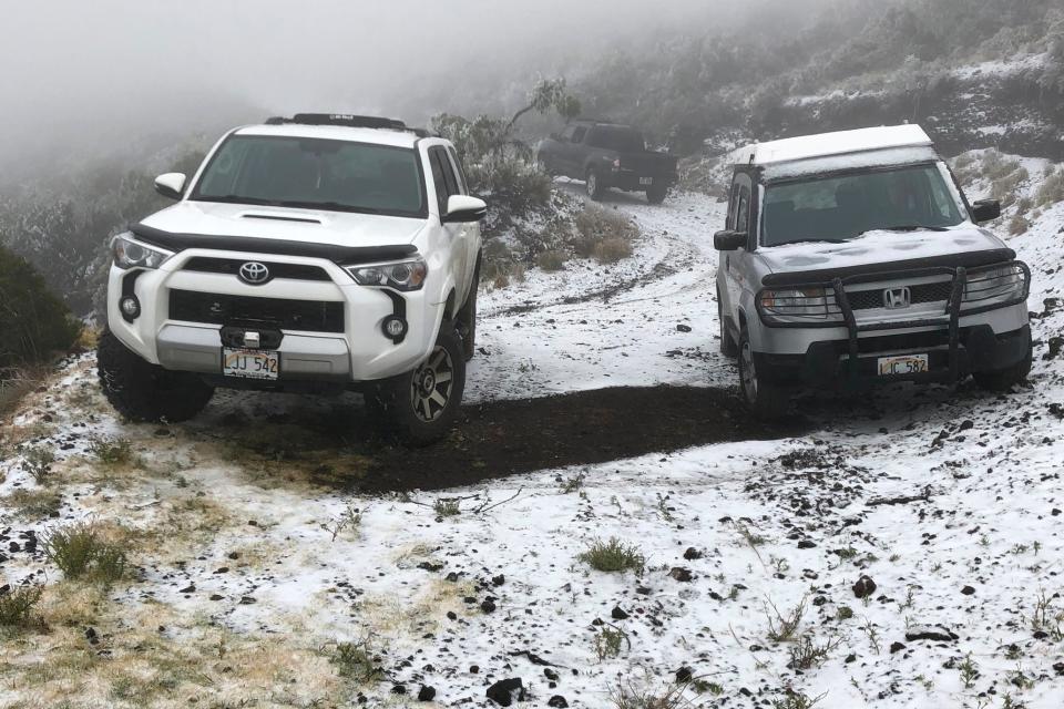 Photos of Hawaii blanketed by snow illustrate just how cold the US is right now