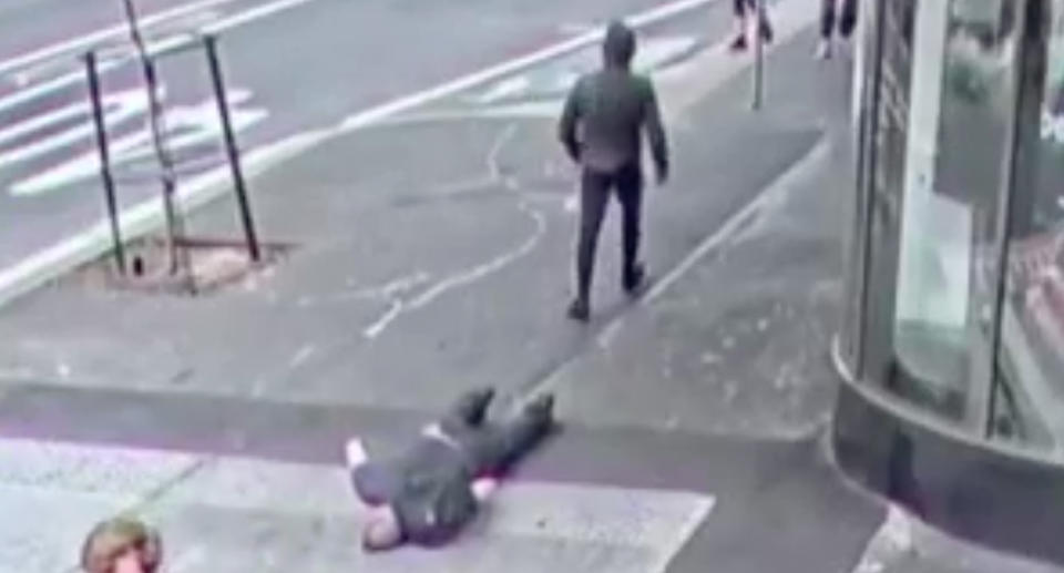 Photo shows man on street in Sydney after being knocked unconscious.