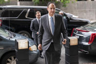 Michael Sussmann, a cybersecurity lawyer who represented the Hillary Clinton presidential campaign in 2016, arrives to the E. Barrett Prettyman Federal Courthouse, Monday, May 16, 2022, in Washington. Sussmann is accused of making a false statement to the FBI during the Trump-Russia probe. (AP Photo/Evan Vucci)