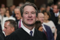 FILE - In this Feb. 5, 2019 file photo, Supreme Court Associate Justice Brett Kavanaugh watches as President Donald Trump arrives to give his State of the Union address to a joint session on Congress at the Capitol in Washington. (Doug Mills/The New York Times via AP, Pool)