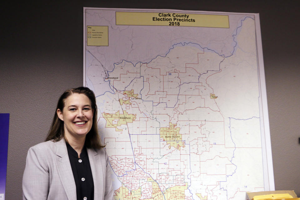 Carolyn Long, a Democratic candidate in the 3rd Congressional District race, with a precinct map in her campaign office in Vancouver, Wash., on Aug. 22, 2018. (Photo: Rachel La Corte/AP)