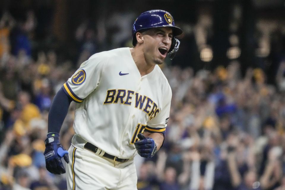 Milwaukee Brewers' Tyrone Taylor reacts after hitting a two-run home run during the second inning of a Game 1 of their National League wildcard baseball game against the Arizona Diamondbacks Tuesday, Oct. 3, 2023, in Milwaukee. (AP Photo/Morry Gash)