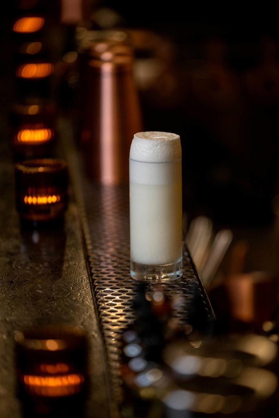 A Ramos Fizz Gin at Scott Crawford’s new cocktail bar, Sous Terre, at 620 North Person Street below Jolie, Crawford’s French bistro.