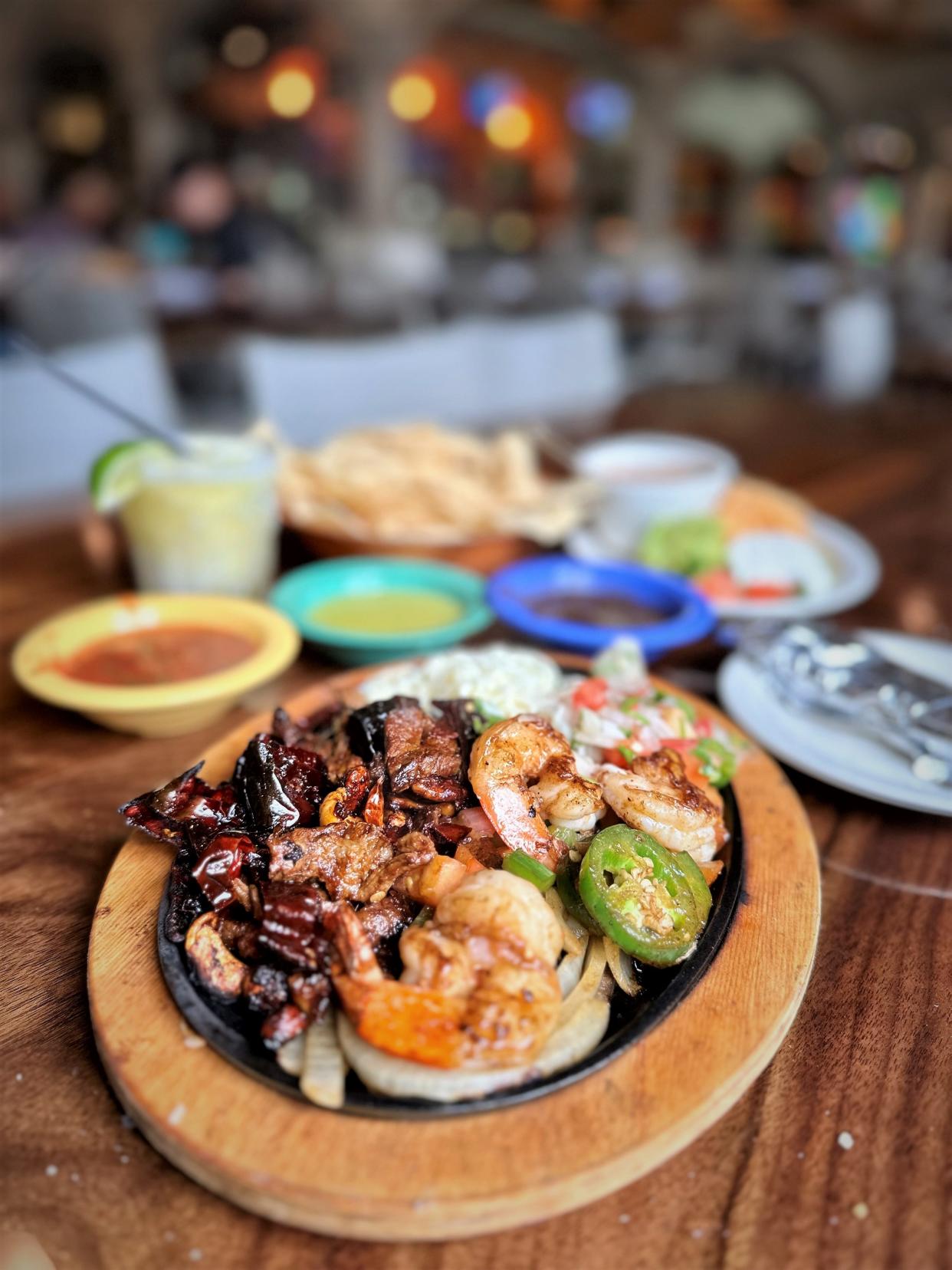 Polvos regulars will recognize dishes like the guajillo fajitas.