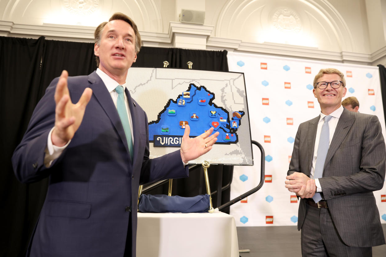 RICHMOND, VIRGINIA - JUNE 15: The governor of Virginia Glenn Youngkin (C) and the CEO of The Lego Group Niels B. Christiansen (R) speak during a press event where The LEGO Group is announcing to build a US $1 billion, carbon-neutral run factory in Virginia, USA. (Photo by Tasos Katopodis/Getty Images  for The LEGO Group )