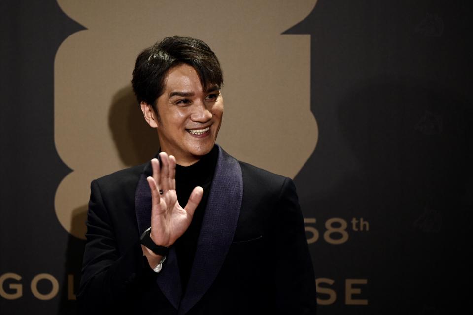 Taiwanese actor Umin Boya arrives at the 58th Golden Horse Film Awards in Taipei on November 27, 2021. / AFP / Sam Yeh