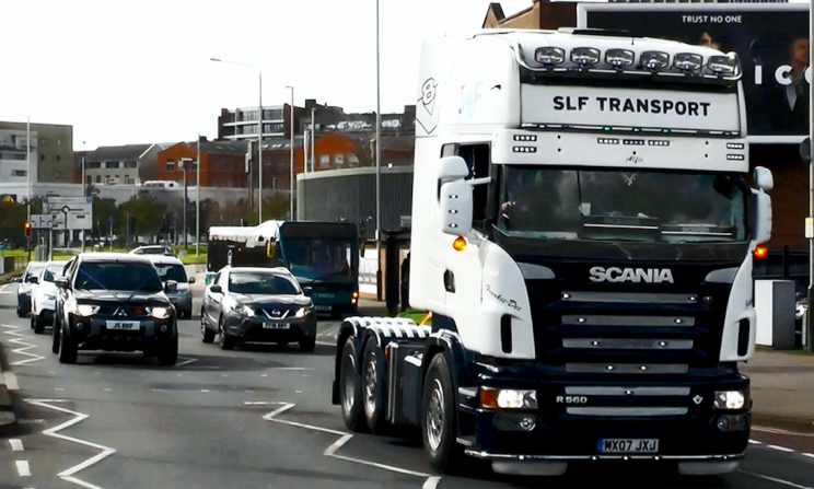 The lorry led a procession of cars to the funeral (SWNS)