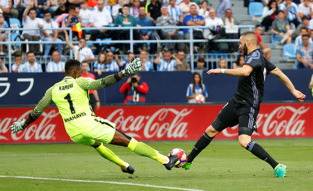 Football Soccer - Malaga v Real Madrid - Spanish Liga Santander - La Rosaleda, Malaga, Spain - 21/5/17 Malaga's Carlos Kameni saves from Real Madrid’s Karim BenzemaReuters / Juan Medina