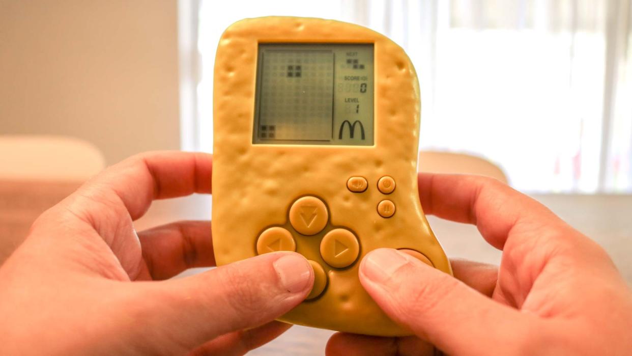  Playing the Chicken McNugget Tetris handheld gaming console 
