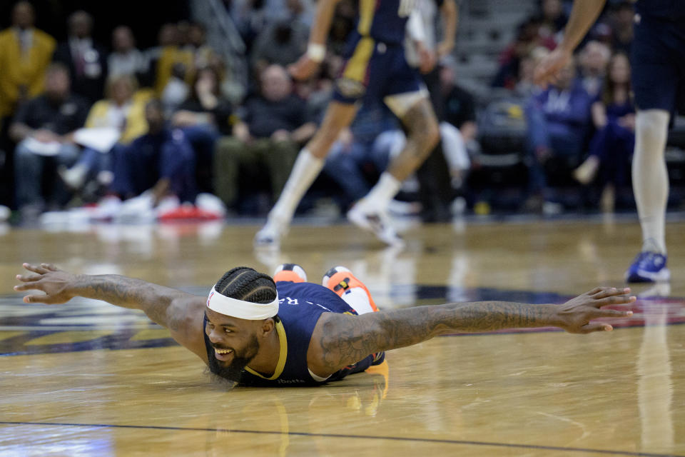 New Orleans Pelicans forward Naji Marshall celebrates after he was fouled by the Houston Rockets during the first half of an NBA basketball game in New Orleans, Wednesday, Jan. 4, 2023. (AP Photo/Matthew Hinton)