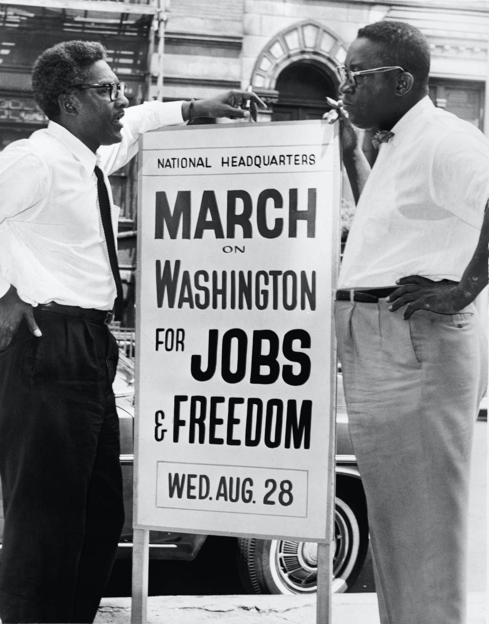 Bayard Rustin, left, is seen on Aug. 7, 1963, talking with Cleveland Robinson during the March on Washington. <a href="https://www.gettyimages.com/detail/news-photo/bayard-rustin-left-and-cleveland-robinson-shown-during-the-news-photo/639609323?phrase=bayard%20rustin&adppopup=true" rel="nofollow noopener" target="_blank" data-ylk="slk:Orlando Fernandez/Library of Congress via Getty Images;elm:context_link;itc:0;sec:content-canvas" class="link ">Orlando Fernandez/Library of Congress via Getty Images</a>