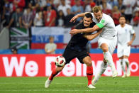 <p>Croatia’s defender Dejan Lovren (L) challenges England’s forward Harry Kane during the Russia 2018 World Cup semi-final football match between Croatia and England at the Luzhniki Stadium in Moscow on July 11, 2018. (Photo by YURI CORTEZ / AFP) </p>