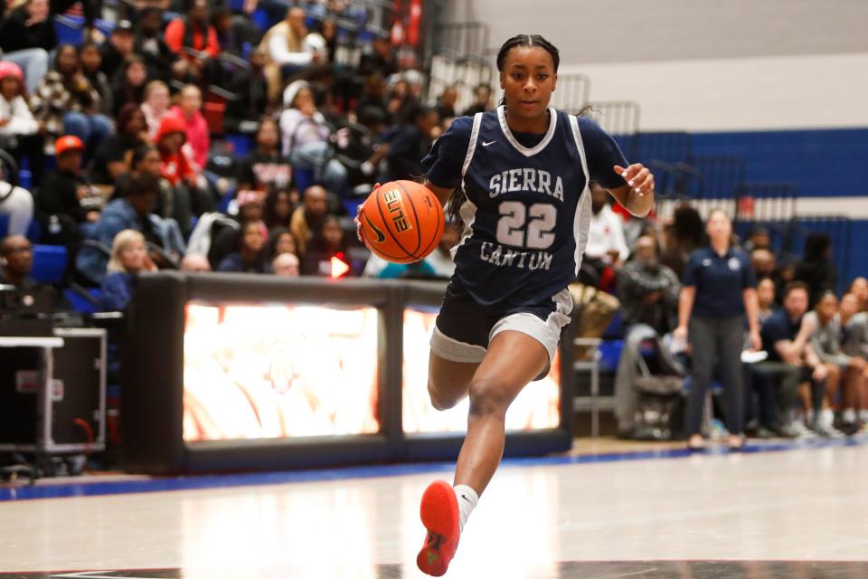 Sierra Canyon’s Izela Arenas (22) dribbles the ball during the game between Bartlett High School and Sierra Canyon School in the 901 Tournament of Champions at Bartlett High School on Friday, December 22, 2023.