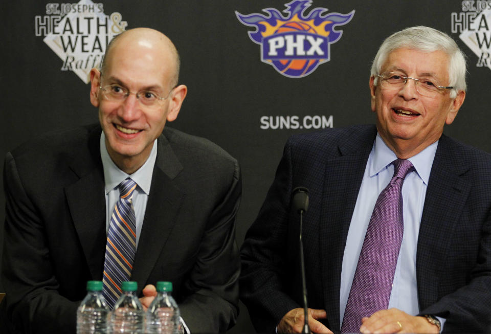 NBA Commissioner David Stern, right, and Deputy Commissioner Adam Silver sit down for news conference prior to an NBA basketball game between the Phoenix Suns and the San Antonio Spurs on Tuesday, March 27, 2012, in Phoenix.(AP Photo/Ross D. Franklin)