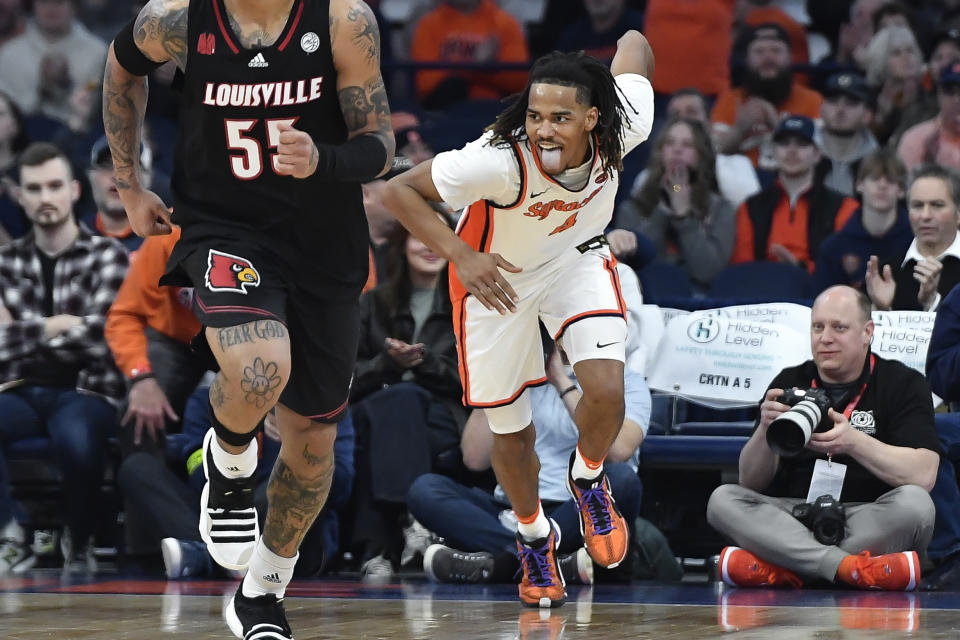 Syracuse forward Chris Bell reacts during the first half of the team's NCAA college basketball game against Louisville in Syracuse, N.Y., Wednesday, Feb. 7, 2024. (AP Photo/Adrian Kraus)