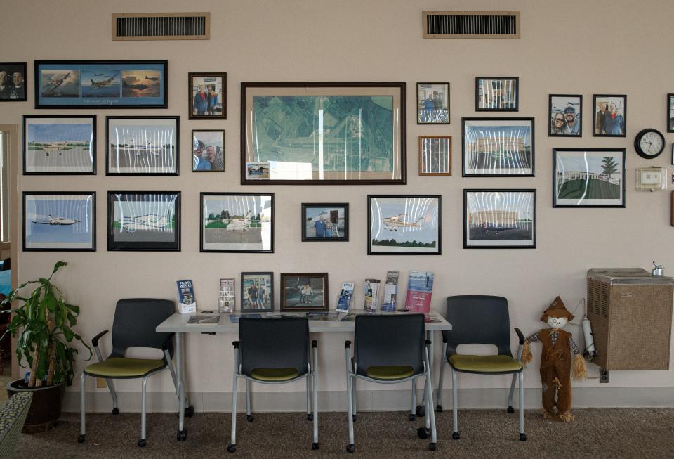 The lobby of the Maury County Airport shows images and maps over the years of planes, routes and notable people, who have flown through the airport in Mount Pleasant, Tenn. on Wednesday, June 14, 2023.