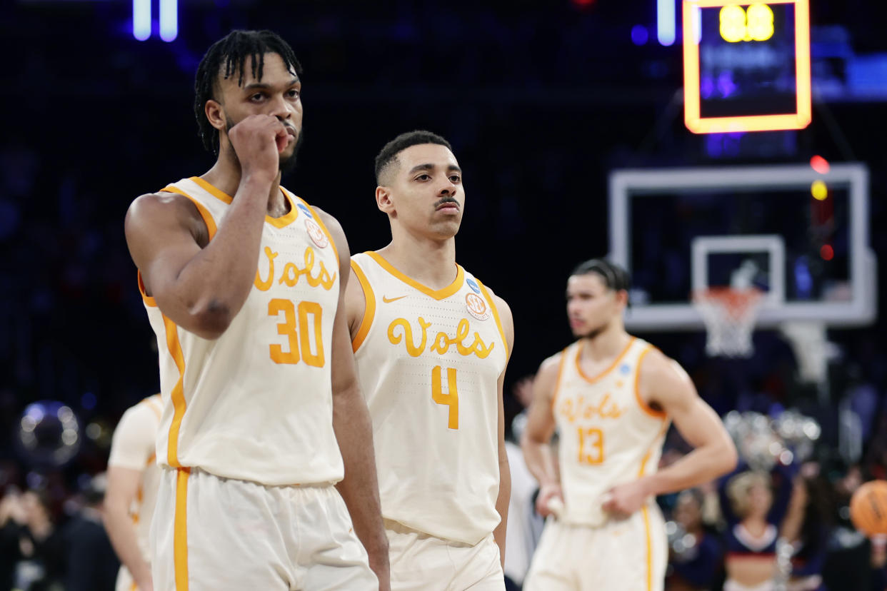 Tennessee guards Josiah-Jordan James (30) and Tyreke Key (4) walk off the court after the team was defeated by Florida Atlantic in a Sweet 16 college basketball game in the East Regional of the NCAA tournament at Madison Square Garden, Thursday, March 23, 2023, in New York. (AP Photo/Adam Hunger)