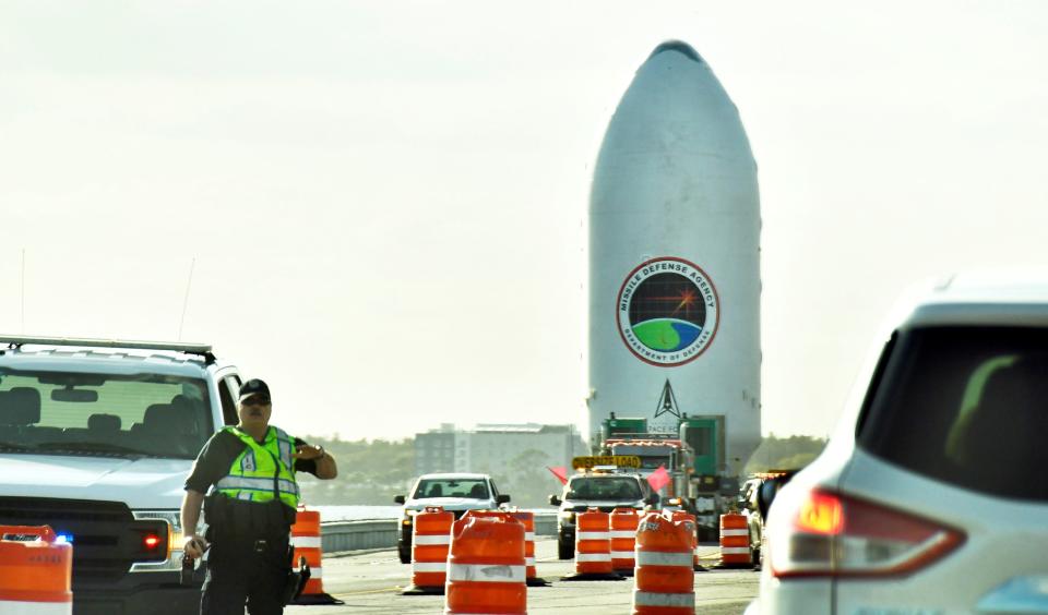 Was this USSF-124? What appears to be an unidentified U.S. Department of Defense encapsulated rocket payload is escorted over the shut-down NASA Causeway on Saturday afternoon en route to the Cape.
