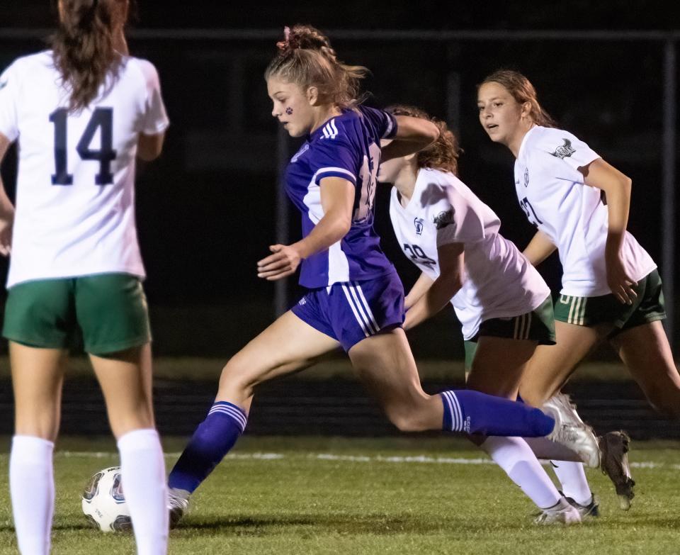 Jackson’s Emily Adams scores an unassisted goal to defeat GlenOak 1-0 in overtime in a district semifinal, Monday, Oct. 23, 2023.